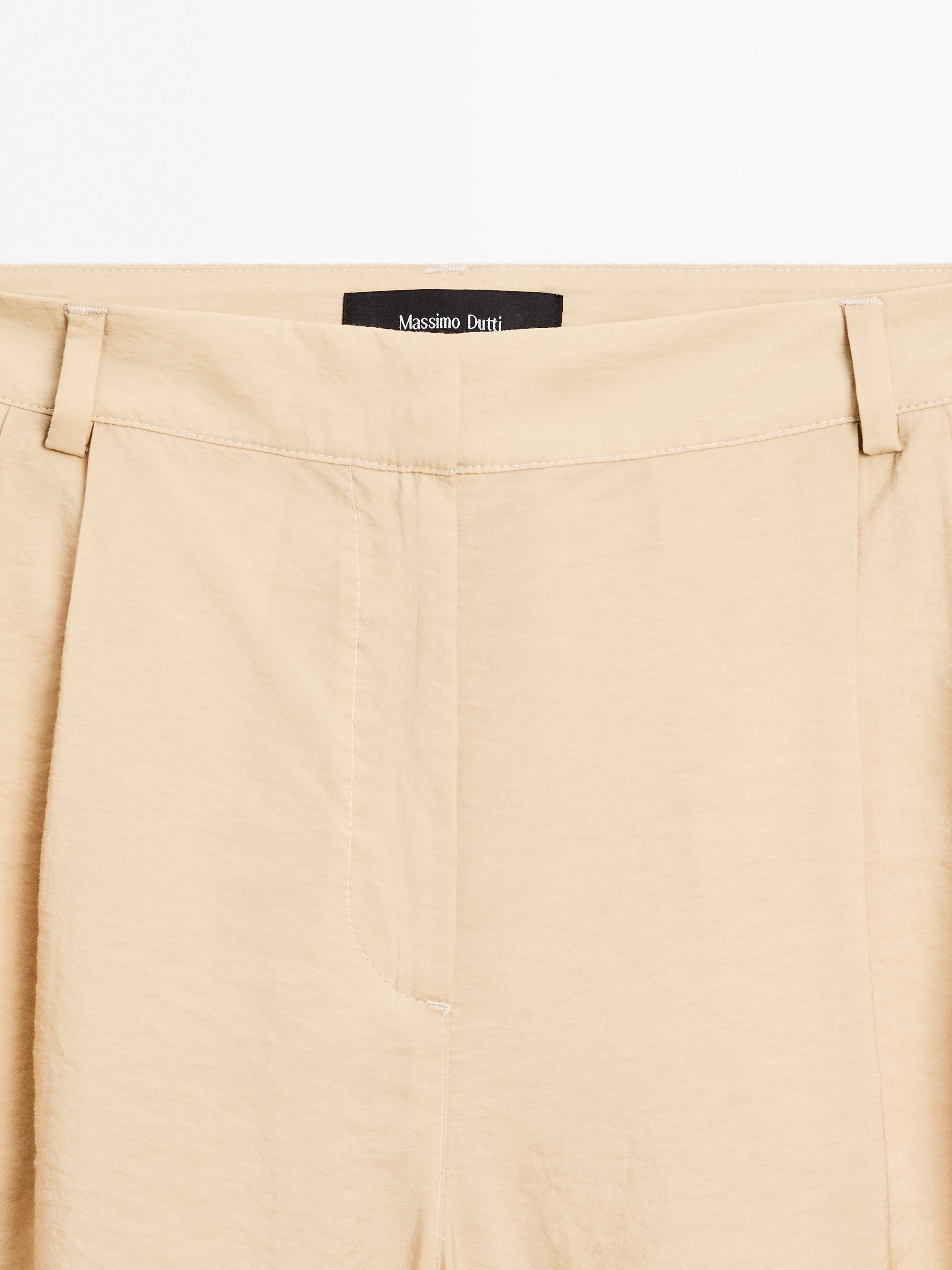 Pantalon palazzo à pinces